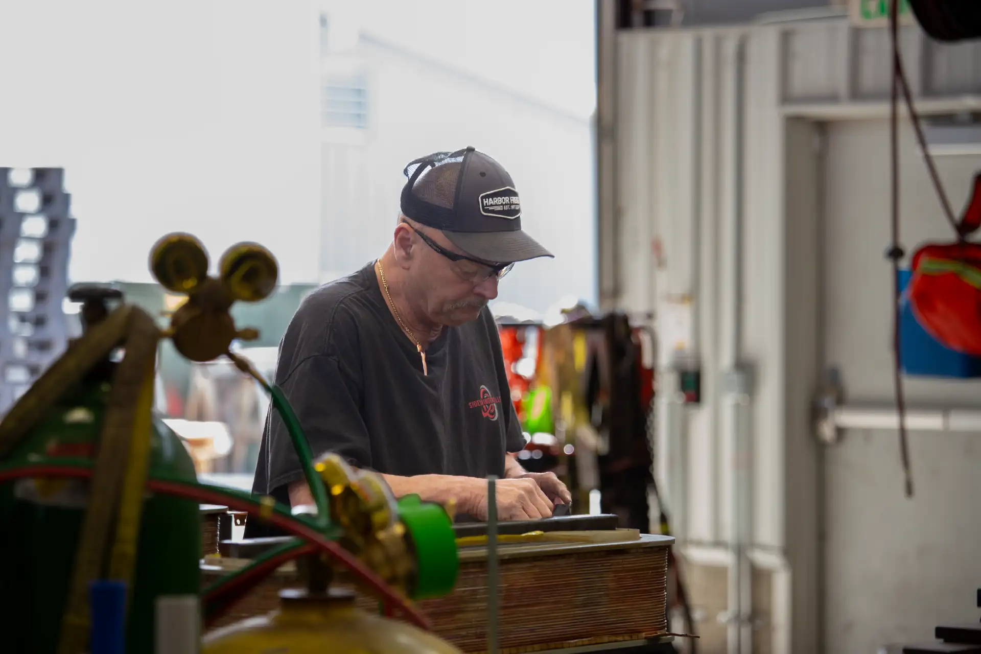 Sidewinders working on copper coil part.